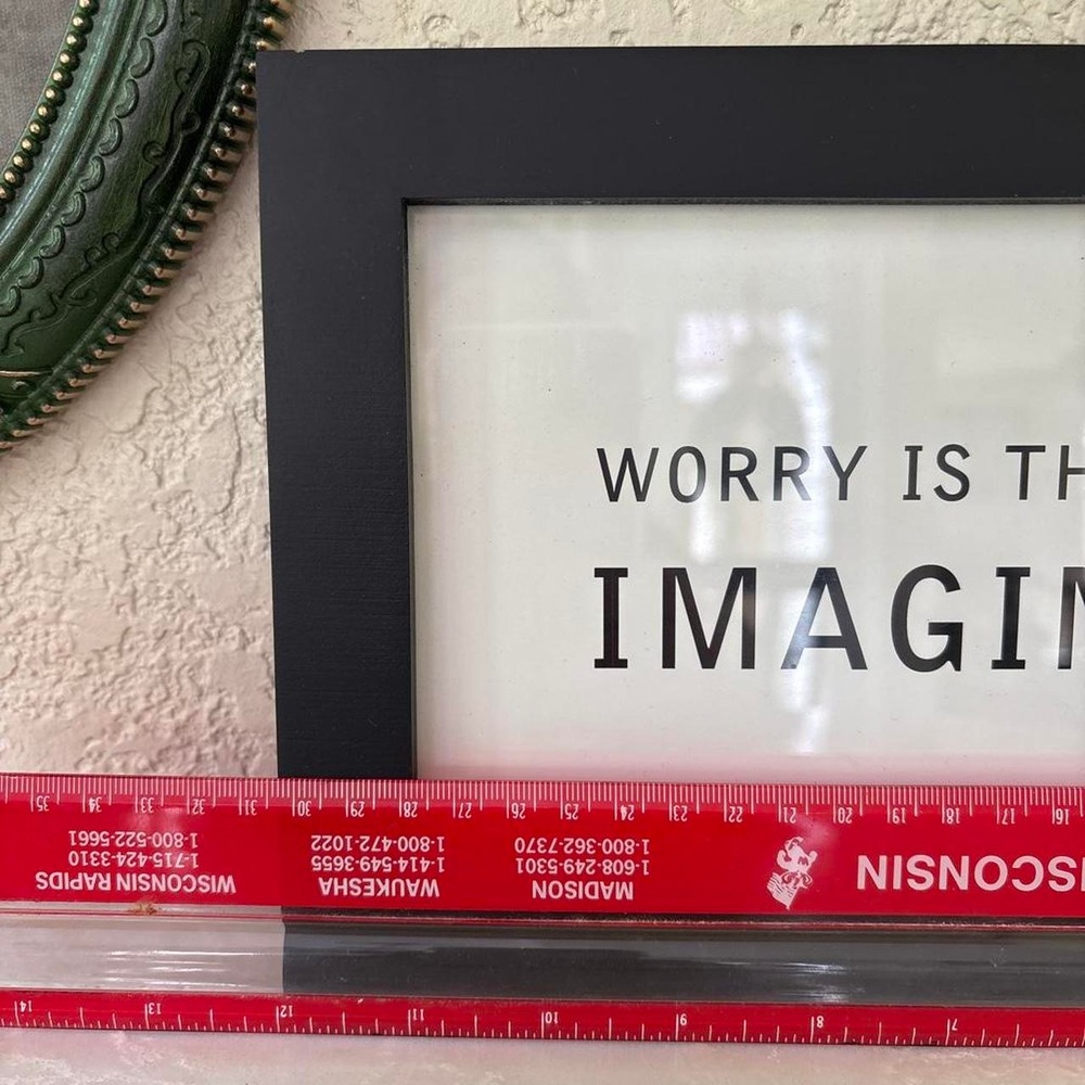 Black framed "Worry is the Misuse of Imagination" sign - Picture 2 of 7